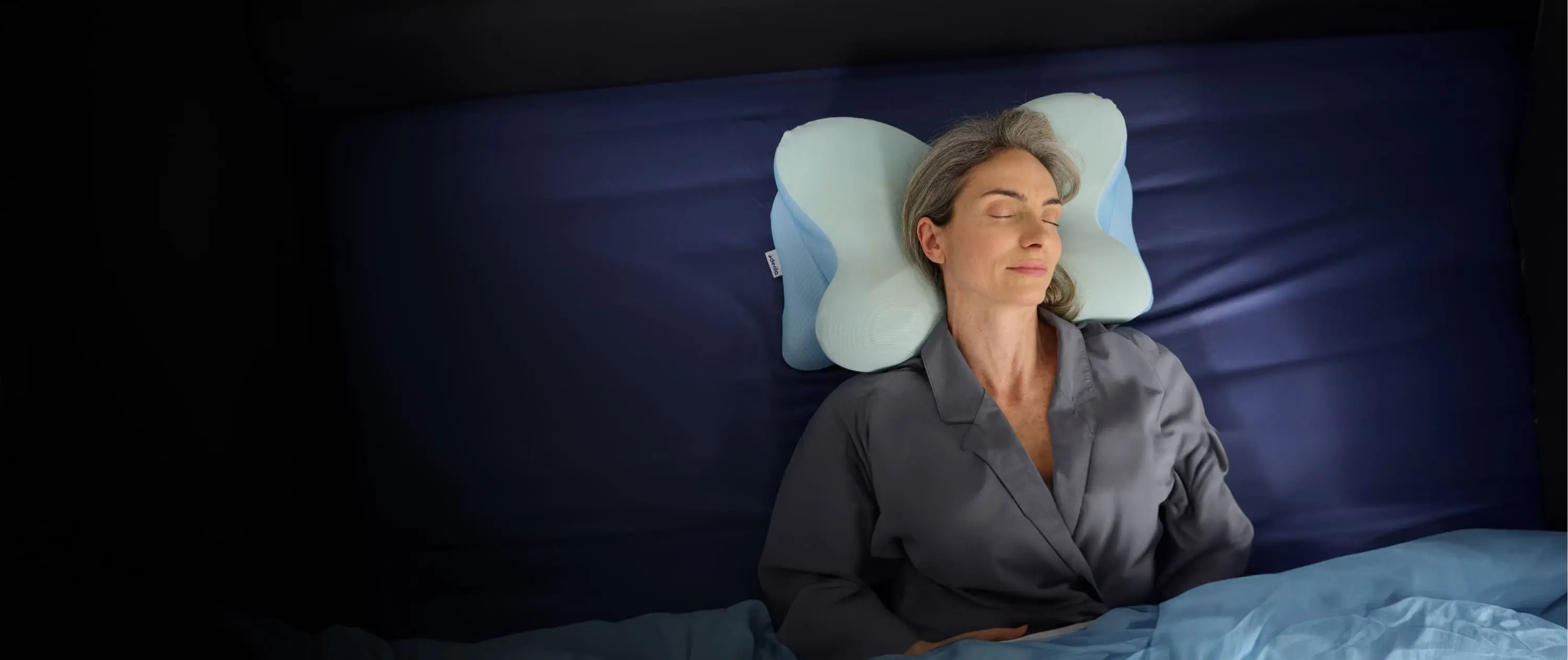 Doctor demonstrating ergonomic pillow
