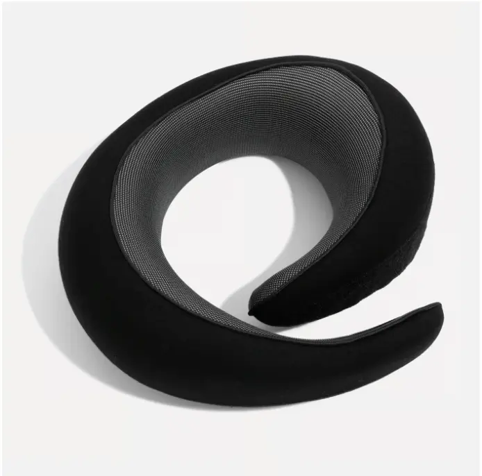 Woman sleeping comfortably on a plane with travel pillow